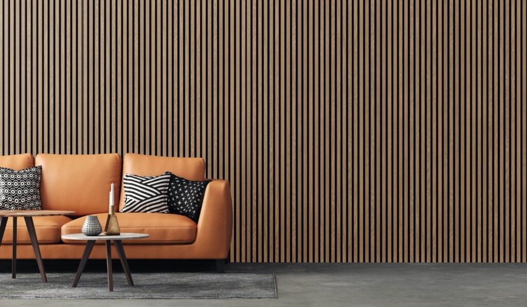 Room with Orange Couch Featuring Proff Series Light Oak FibroTech Acoustic Panels